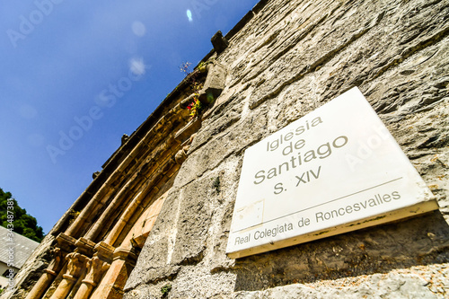 sign on wall of building, photo as a background , in Navarra Aragon Zaragoza spain europe , roncisvalle camino de santiago city photo