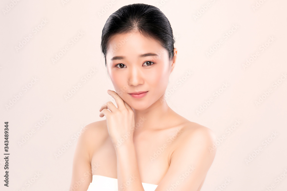 Beautiful Young Asian Woman with Clean Fresh Skin. Face care, Facial treatment, Cosmetology, beauty and healthy skin and cosmetic concept, woman beauty skin isolated on white background Beautiful Young Asian Woman with Clean Fresh Skin. Face care, Facial treatment, Cosmetology, beauty and healthy skin and cosmetic concept, woman beauty skin isolated on white background