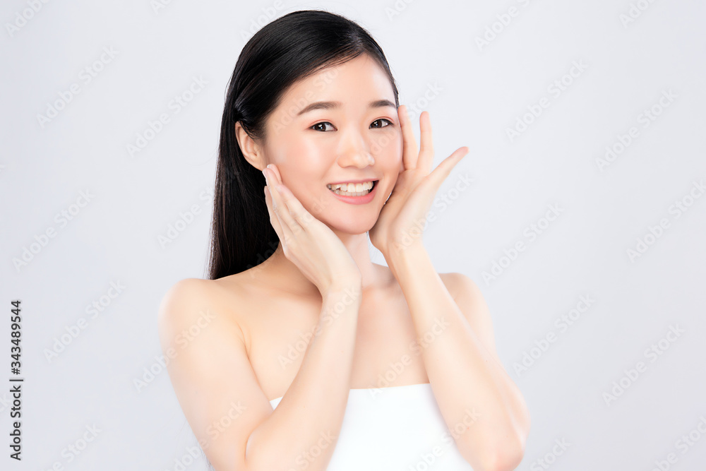Beautiful Young Asian Woman with Clean Fresh Skin. Face care, Facial treatment, Cosmetology, beauty and healthy skin and cosmetic concept, woman beauty skin isolated on white background Beautiful Young Asian Woman with Clean Fresh Skin. Face care, Facial treatment, Cosmetology, beauty and healthy skin and cosmetic concept, woman beauty skin isolated on white background