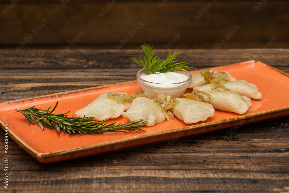 Dumplings with potato on wooden background Dumplings with potato on wooden background