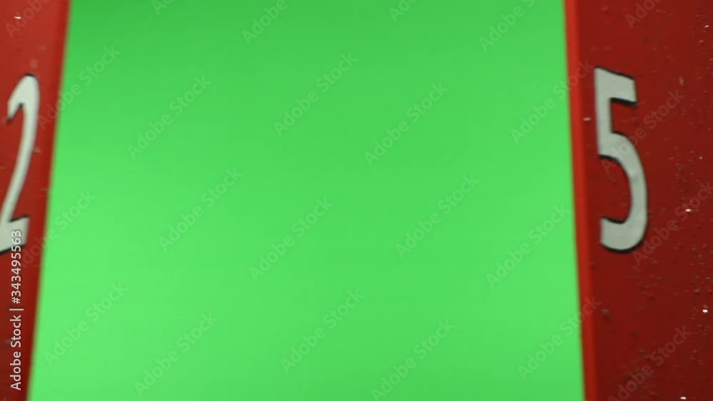 Advent Calendar door opening on Christmas day to reveal Green Screen. Stock Video Clip Footage