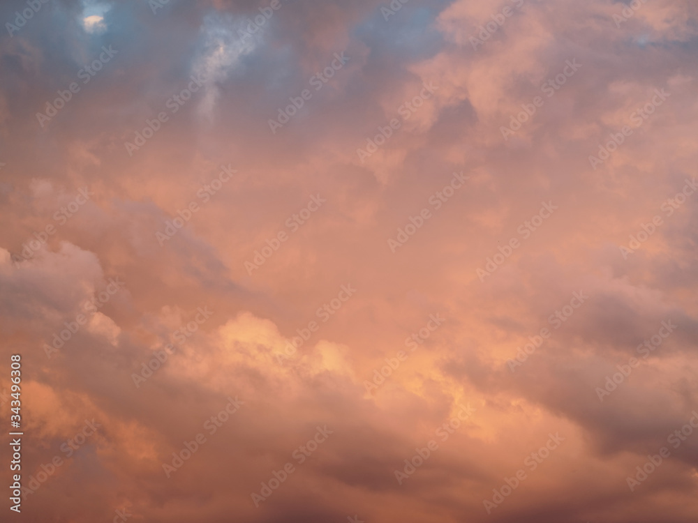 Beautiful clouds at sunset. Background with a beautiful sky.