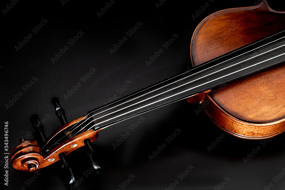 Fototapeta premium close up violin strings detail with black background top view wallpaper