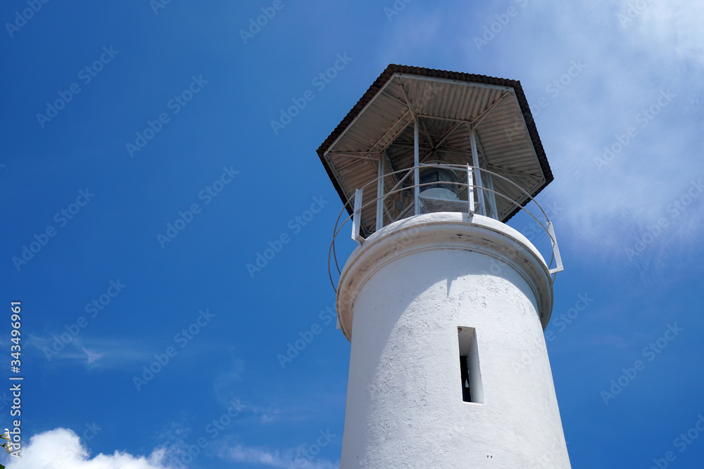 Lighthouse with clear blue sky background at Tang Kuan Mountain Songkhla