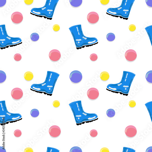 Spring seamless pattern with blue gumboots and voluminous polka dots.