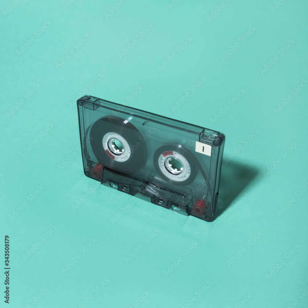 Music inspired flatlay with black audio cassette Music inspired flatlay with black audio cassette