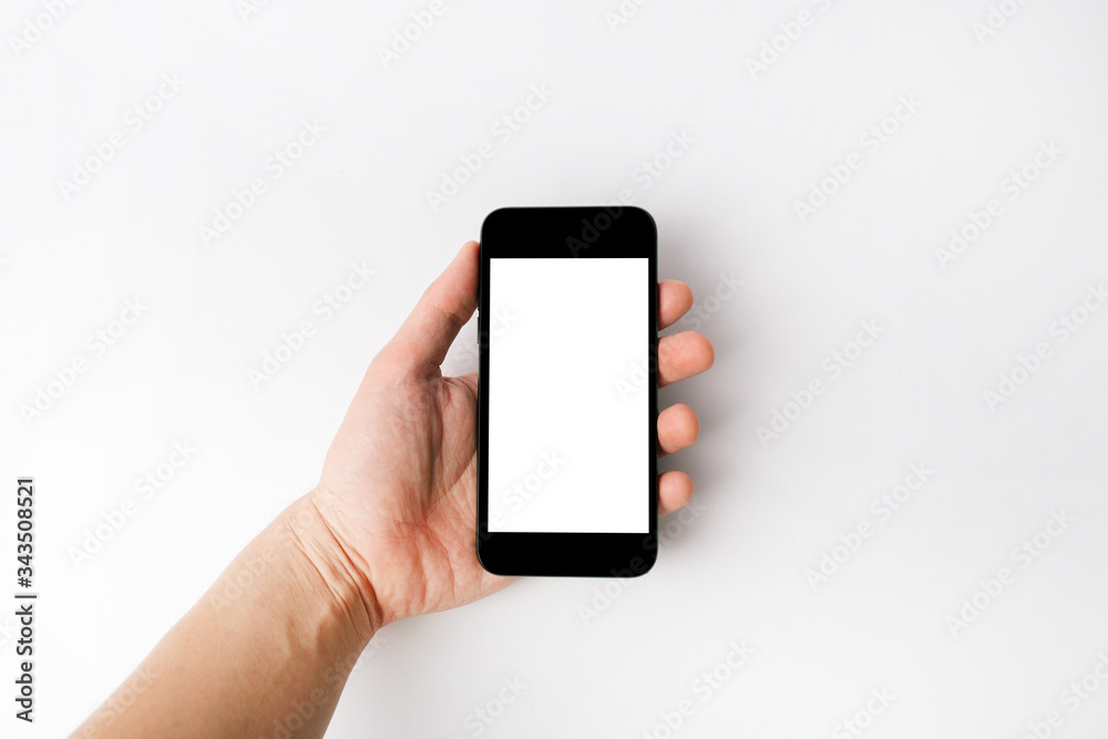Mockup image of black mobile phone with blank white screen. Mockup image of black mobile phone with blank white screen.