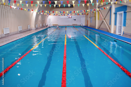 Swimming lanes in the sports pool. © olgasparrow