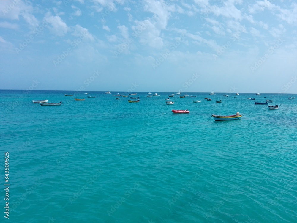 blue sea with many boatd in cabo verde