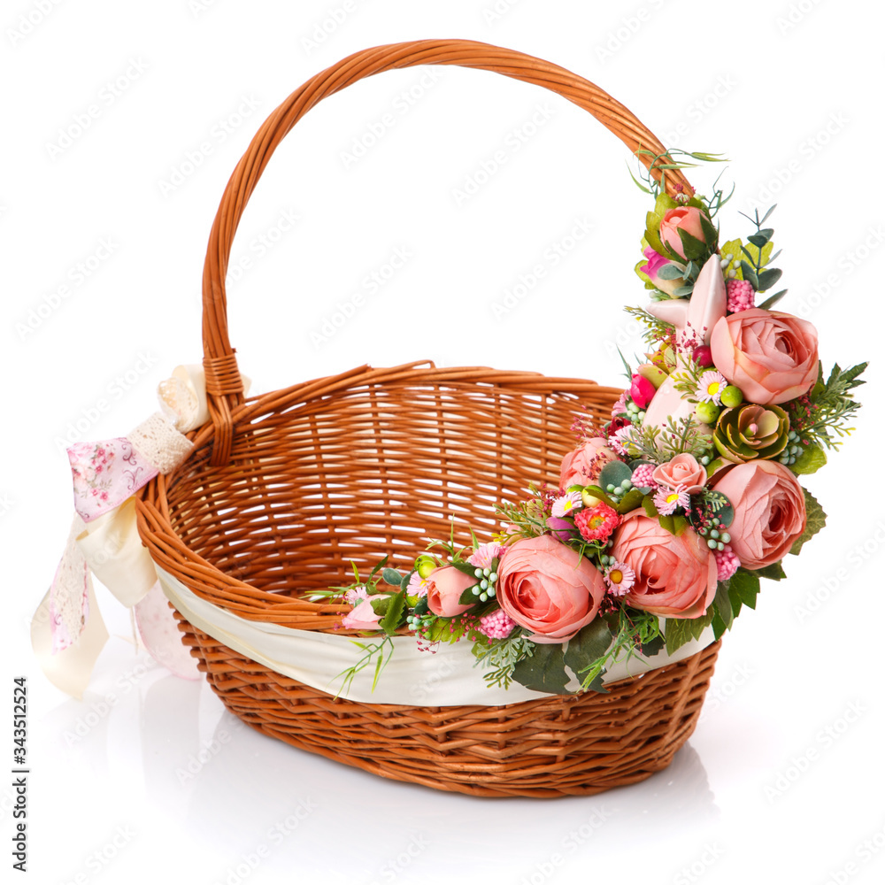 Provence Easter floral arrangement on a wicker basket with a vine. Isolated - obrazy, fototapety, plakaty 