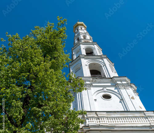 DZERZHINSKY, MOSCOW REGION, RUSSIA - may 2018: Exterior of the Nikolo-Ugreshsky Monastery, courtyard view. Founded in 1380. Forerunner Church. photo