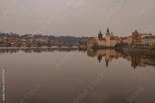  view of the river and reflections in it. Old Prague architecture by the river Vltava. In the Czech Republic