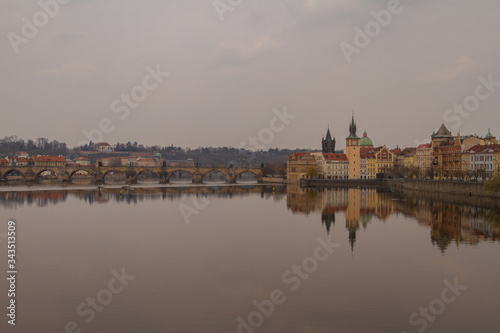  view of the river and reflections in it. Old Prague architecture by the river Vltava. In the Czech Republic