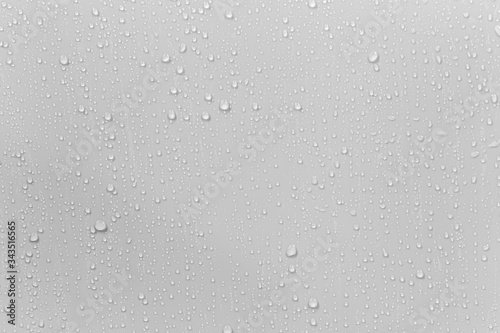 The concept of raindrops falling on a gray background Abstract wet white surface with bubbles on the surface Realistic pure water droplet water drops for creative banner design