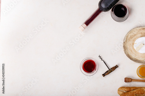 Glass of red wine served with cheese