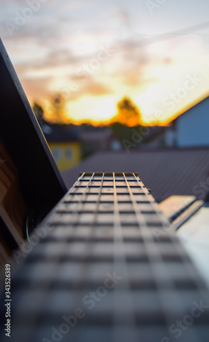 Guitar Close up at sunset 