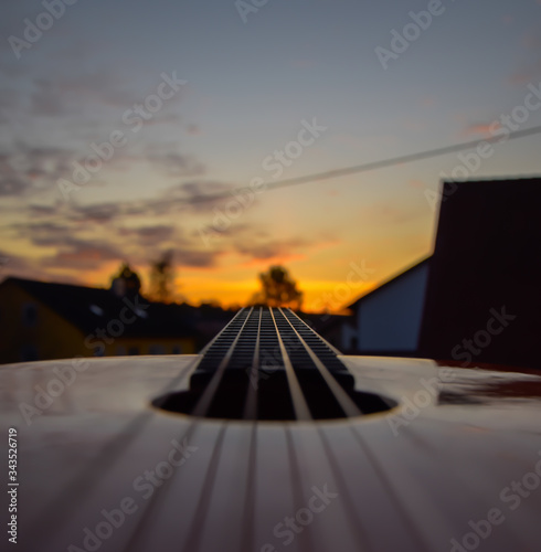 Guitar Close up at sunset 