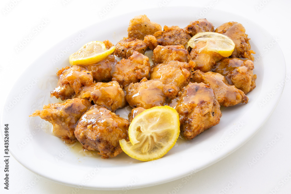 Sticky Chinese Lemon Chicken on the plate Sticky Chinese Lemon Chicken on the plate