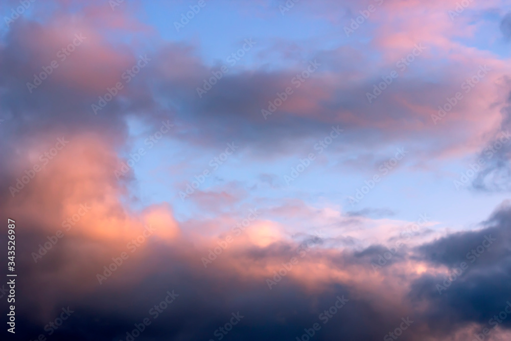 Dramatic sky with clouds on sunset evening. Natural abstract background.