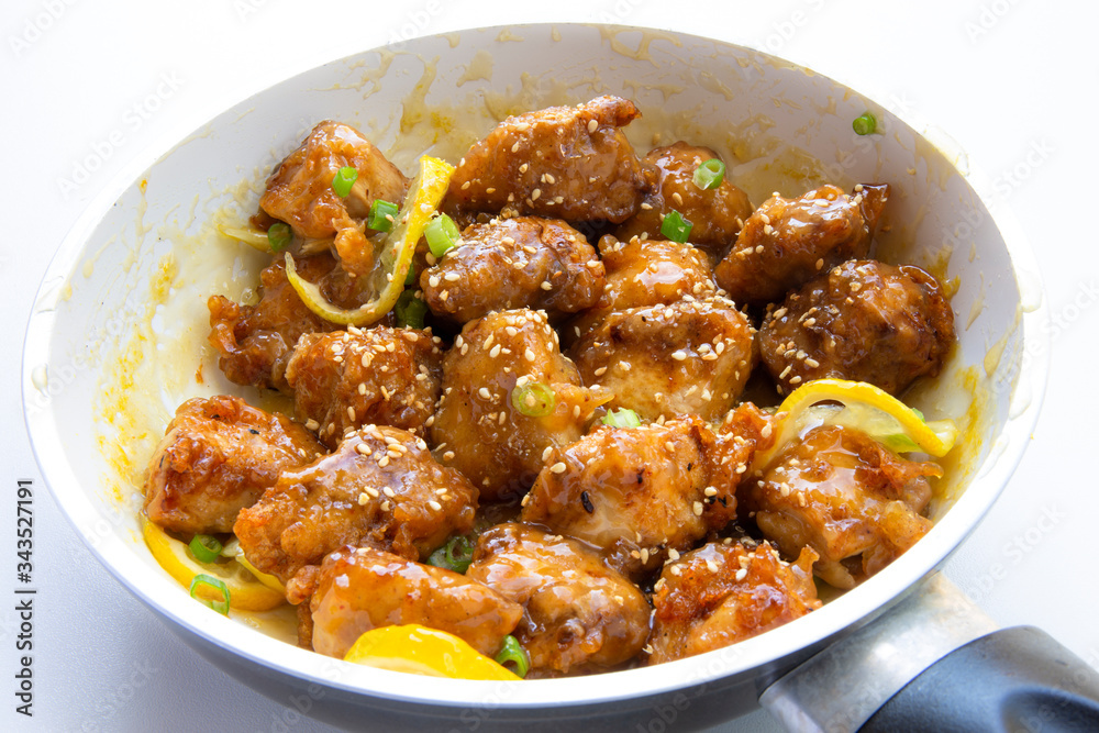 Sticky Chinese Lemon Chicken on the plate Sticky Chinese Lemon Chicken on the plate