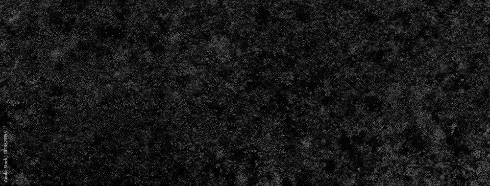 Fototapeta premium Black background of a texture of cement wall, stone and concrete, with some little moss - Dark stage background - Large panoramic format