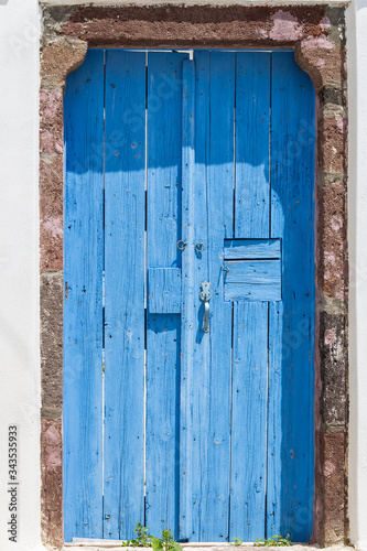old blue door in old house
