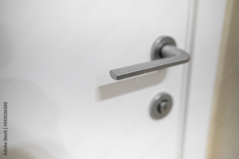 Modern, contemporary satin handle and keyhole detail Modern, contemporary satin handle and keyhole detail