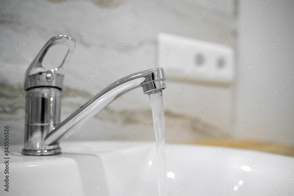 Bathroom interior with sink and faucet. Bathroom interior with sink and faucet.