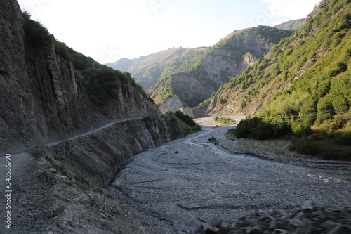 Mountainous road leading to Lahic village in Ismayilli region of Azerbaijan, with car. photo
