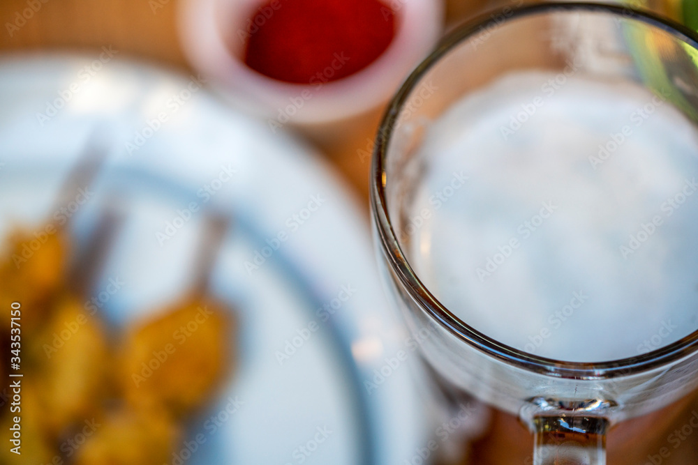 the delicious plate of Turkish style fried mussel and cold beer the delicious plate of Turkish style fried mussel and cold beer