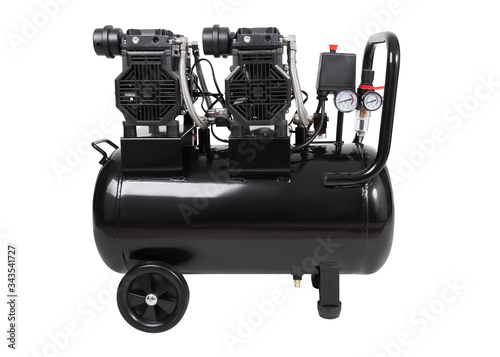 Oil-free portable single-stage air compressor. Black air compressor. Side view. Isolated on a white background

