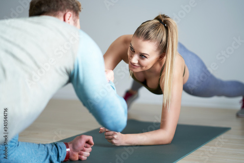 Woman with her personal fitness trainer