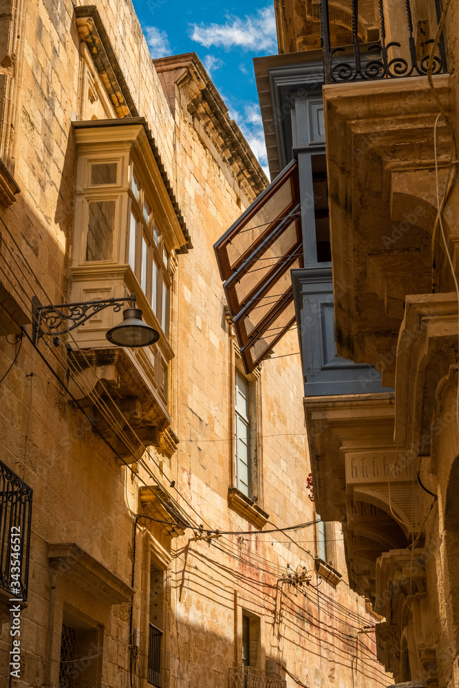 Three Cities Birgu Senglea and Cospicua Old Architecture. Details ancient streets, alleys and limestone walls. Travel location Malta.