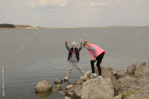 
Family outdoor activities. Children play on the lake.