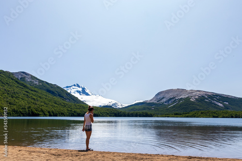 girl on the mountain lake