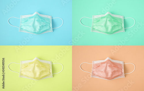 Surgical face mask on colorful background protection against COVID-19 coronavirus. Healthcare and medical concept, minimal style