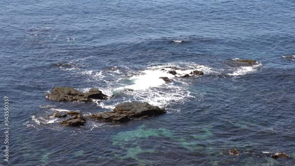 Video of waves crashing against rocks Video of waves crashing against rocks