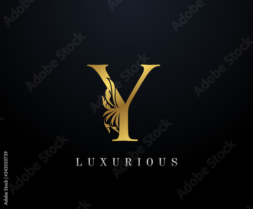 Gold Luxury letter Y Floral logo. Vintage drawn emblem for book design, weeding card, brand name, business card, Restaurant, Boutique, Hotel. © bintank
