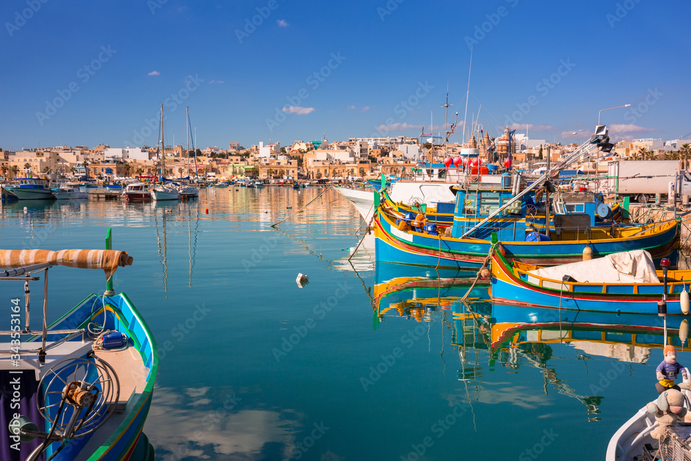 Obraz premium Fishing boats in the Mediterranean Village of Marsaxlokk, Malta