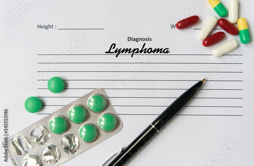 Lymphoma diagnosis written on a white piece of paper.