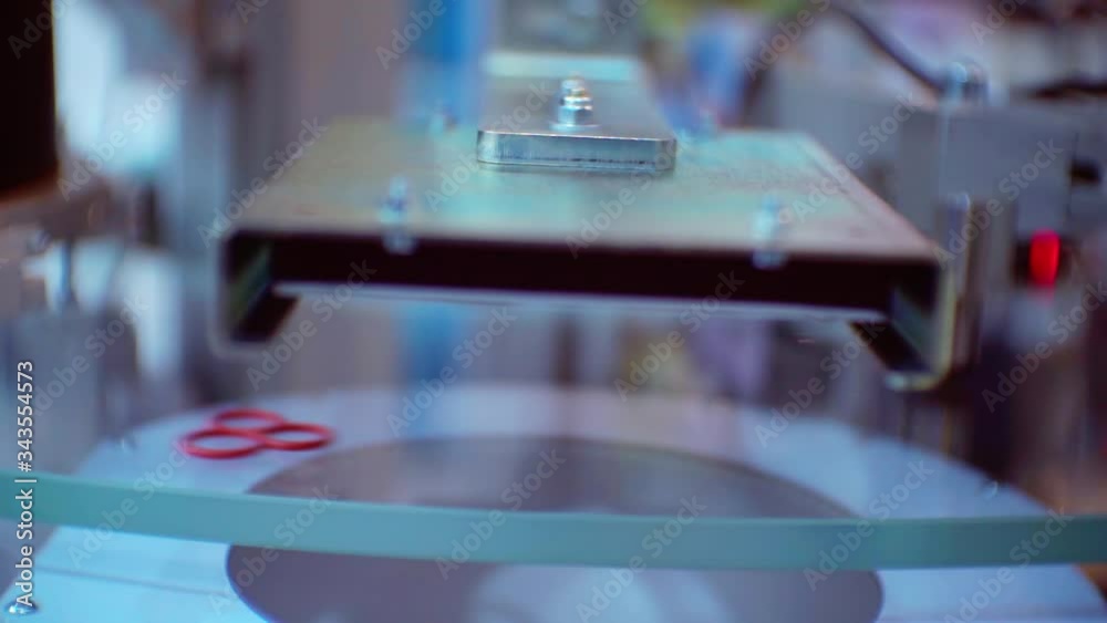 small details move quickly on a transparent conveyor small details move quickly on a transparent conveyor