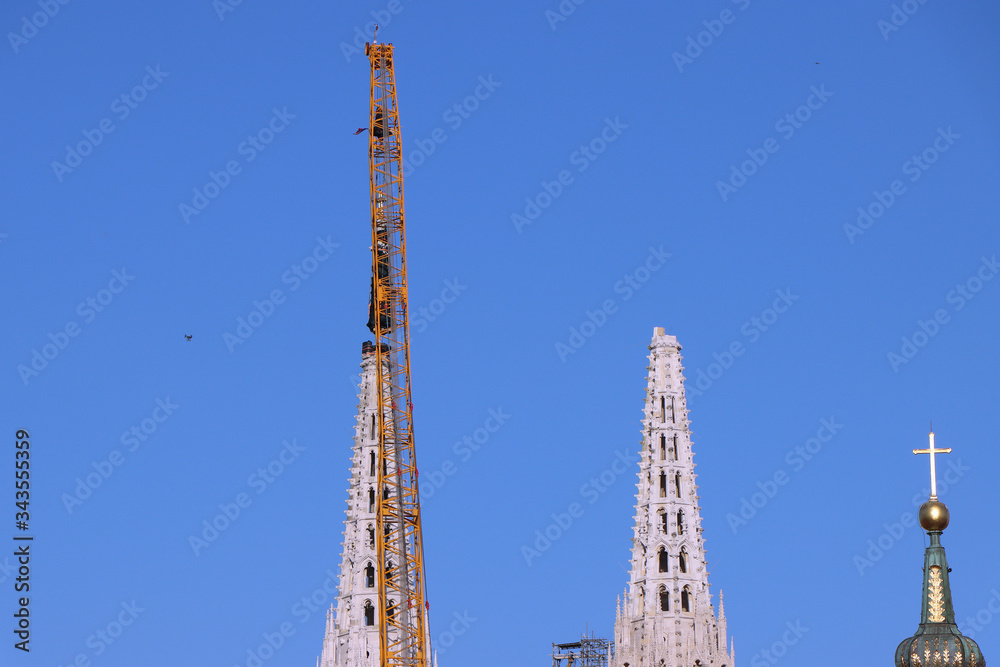 Obraz premium Removal part of the left tower of Zagreb Cathedral, damaged in the earthquake of March 22. 2020. The right tower itself collapsed.