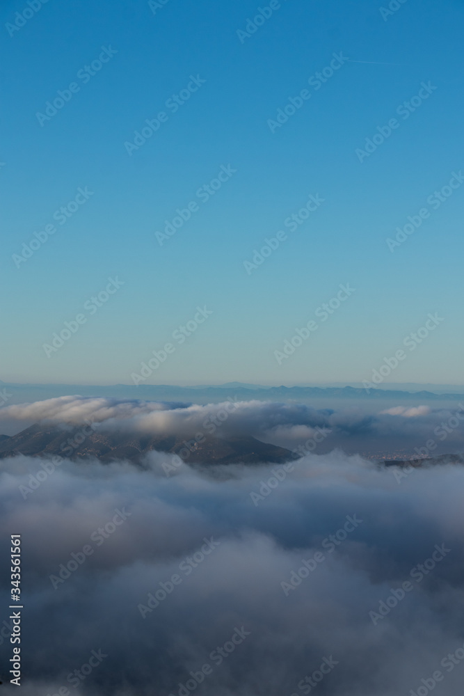 Panoramic view of sea of clouds over mountain peaks