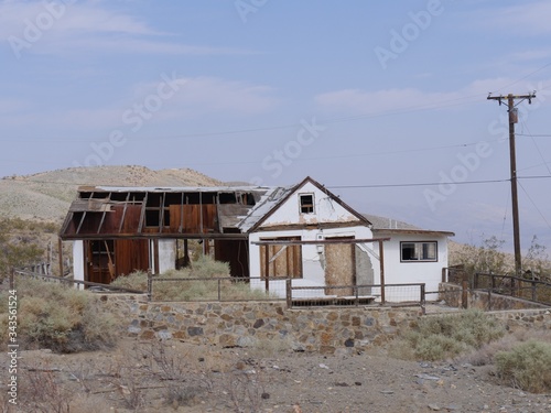 Remains of a dilapidated structure at Randsburg, a ghost town at the slope of Rand Mountain in California. © raksyBH