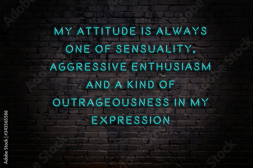 Smart and motivational quotation. Neon sign on brick wall photo