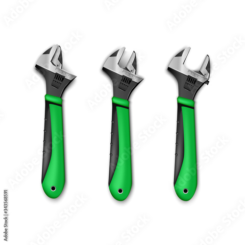 set of plumber master instrument adjustable wrench with green handles. Isolated on white background.
