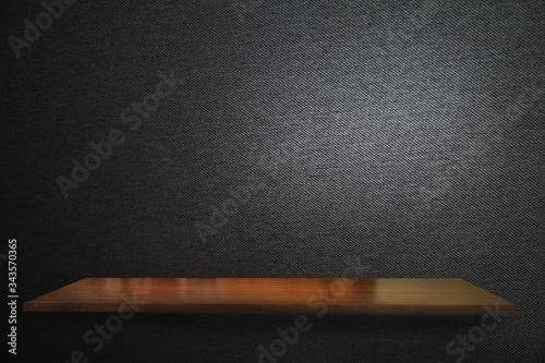 Empty top of wooden shelf and stone wall background. To display the product