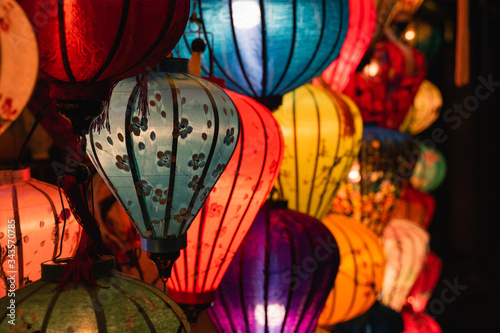 A group of colorful illuminated silk lanterns