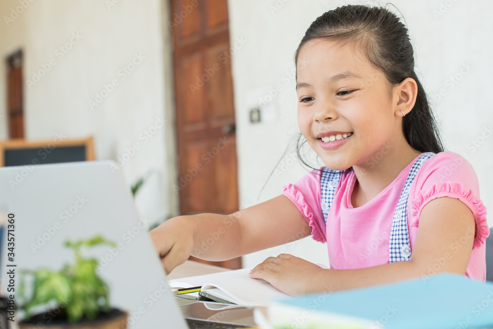 asian girl student online learning study online with video call teacher. social distance during quarantine, self-isolation, online education concept, homeschool, stay at home entertainment. asian girl student online learning study online with video call teacher. social distance during quarantine, self-isolation, online education concept, homeschool, stay at home entertainment.
