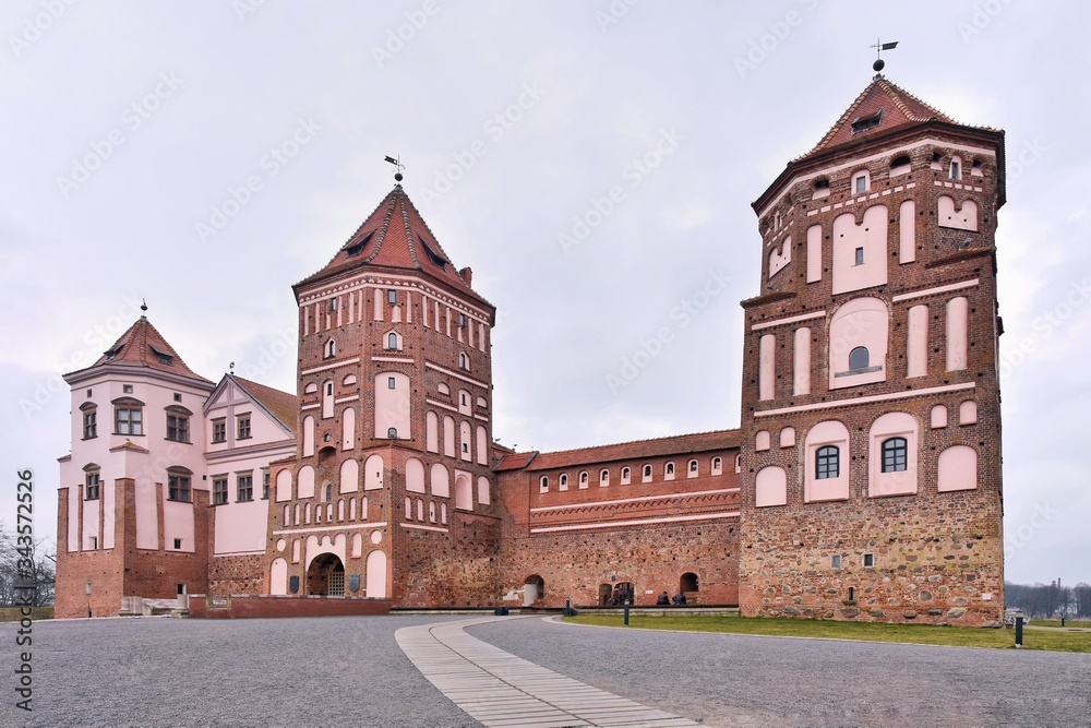 Minsk, Belarus - March 2020. Beautiful medieval Mir castle. Famous landmark in Belarus. Red bricks old castle complex Mirsky zamok. UNESCO world heritage
